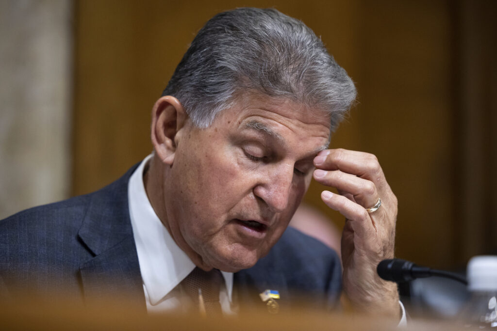Manchin opens new front in war on Biden EV policies