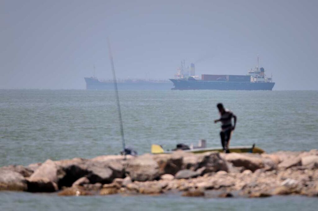 UN agency pauses evacuation of ships through the Strait of Hormuz after attack on vessel
